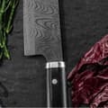 Miniatyrbild 3 av 3: Kockkniv Kizuna Kyocera med 18 cm keramikblad och svart handtag