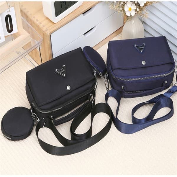 INF Alsidig nylon skuldertaske, multi-rums crossbody tote 0