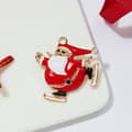 Miniatyrbillede 1 af 2: Broche med julemanden der skøjter guld diamant
