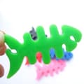 Miniatyrbild 2 av 4: Kabelhållare för Hörlurar Fish-shaped - Grön