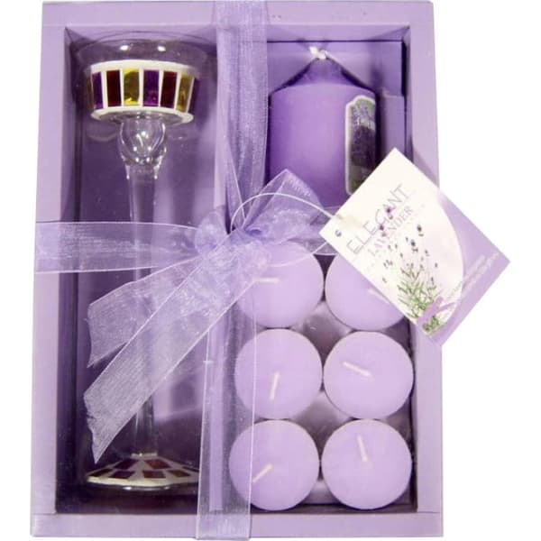 Elegant lila ljusset med ljushållare i glas