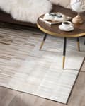 Pikkukuva 2 / 7: Matto beige lehmännahka 140 x 200 cm tilkkukuvio käsintehty suorakulmio rustiikkinen tyyli