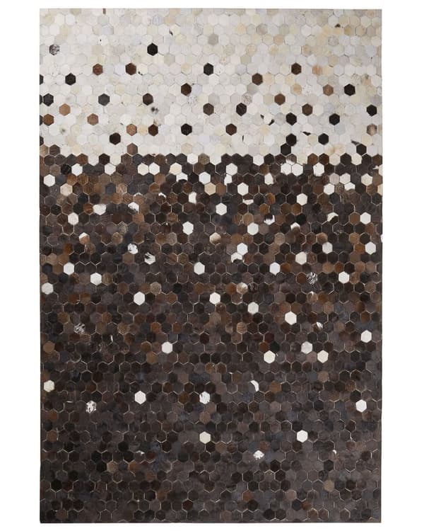 Matto beige ruskea lehmännahka 140 x 200 cm käsintehty geometrinen kuvio industriaalinen tyyli