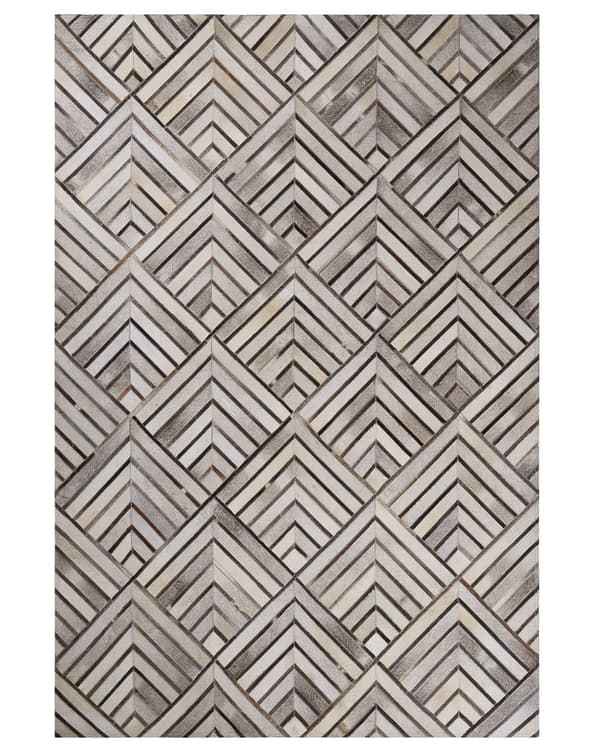 Matto beige lehmännahka 140 x 200 cm käsintehty geometrinen tilkkukuvio retro tyyli