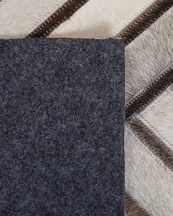 Matto beige lehmännahka 140 x 200 cm käsintehty geometrinen tilkkukuvio retro tyyli