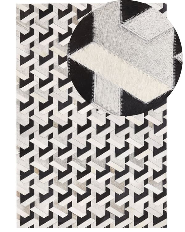 Teppe i svart og hvitt kuskinn 140 x 200 cm Geometrisk mønster med lappeteppe
