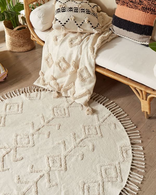 Rundt tæppe Beige Bomuld ⌀ 140 cm Tuftet med frynser mønster Boho Stue Soveværelse