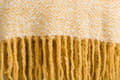 Miniatyrbilde 3 av 3: Toby pledd 170x130cm hvit, gul.
