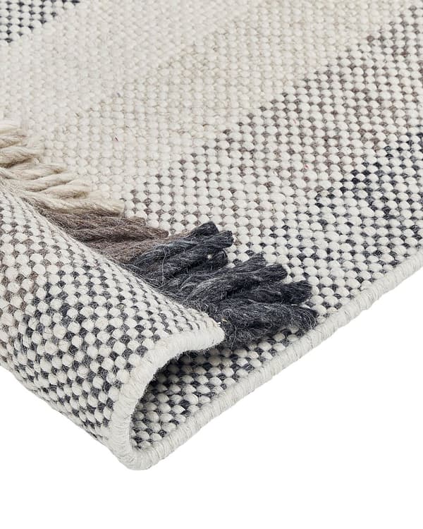 Område tæppe råhvidt uld 140 x 200 cm Rektangulært håndvævet med kvaster Moderne design