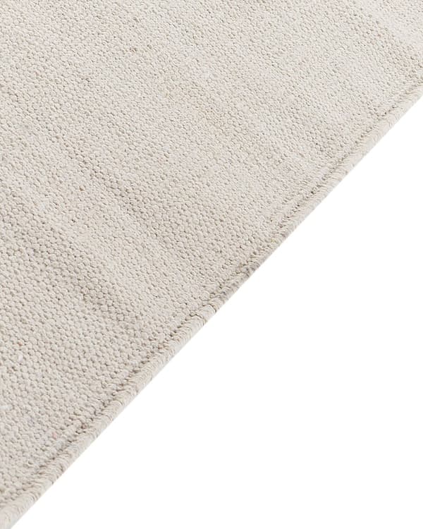Matto beige 140 x 200 cm puuvilla hapsut dinosauruskuvio lasten käsintehty tuftattu moderni