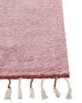Miniatyrbilde 4 av 6: Rosa teppe i bomull 140 x 200 cm Rektangulært med dusker Ensfarget mønster Håndtuftet Moderne Boho til barn