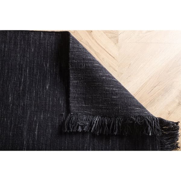 Elton teppe 230x162cm svart.