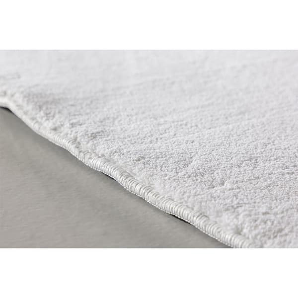 Nixie teppe 170x240 cm hvit.