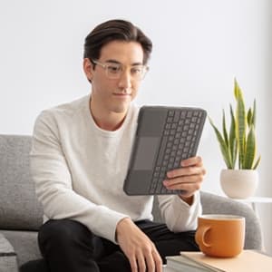 Logitech Folio Touch - tastatur og folio-etui - med pegefelt - baggrundsbelysning - Apple Smart-stik - QWERTY - Spansk - Oxford Grey - til Apple 10,9"
