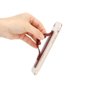 Miniatyrbild 3 av 6: Självhäftande fingertelefonhållare med grå skjutreglage