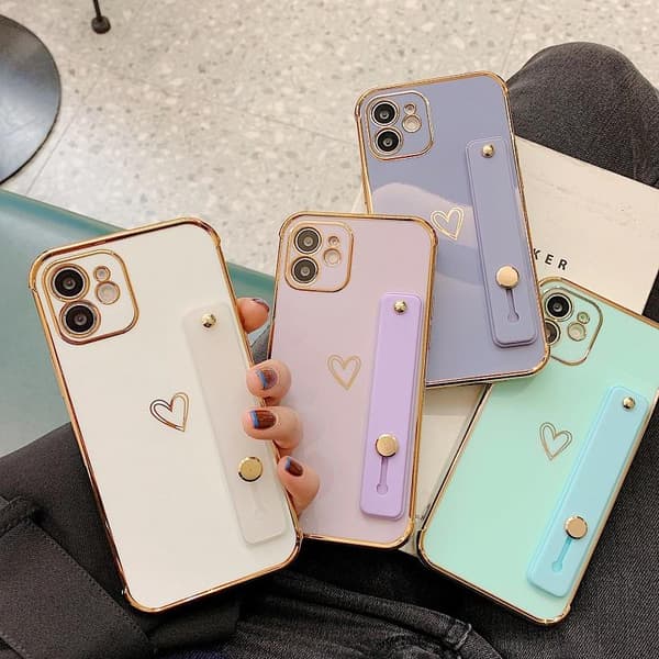 iPhone 13 Pro Max case with heart and ankle strap gold details