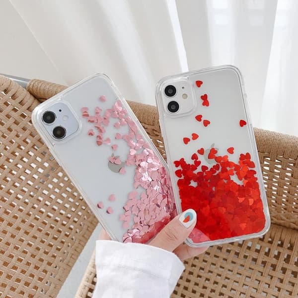 iPhone 13 Pro Max case with floating hearts like quicksand glitter