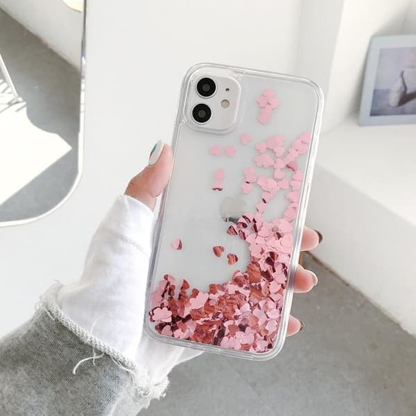 iPhone 14 Pro -kuori kelluvilla sydämillä juoksuhiekka kimallus