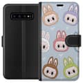 Miniatyrbilde 1 av 3: Samsung Galaxy S10 Lommeboketui Stjärnmönstrat med monsterlook
