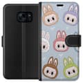 Pikkukuva 1 / 3: Samsung Galaxy S7 Lompakkokotelo Tähtikuvioitu hirviöasenne