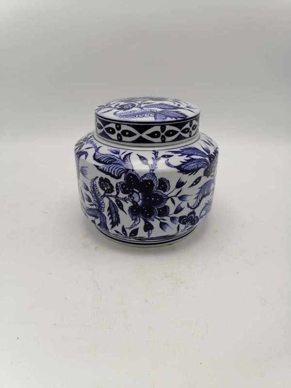 Cute porcelain jar with lid and hand painted pattern