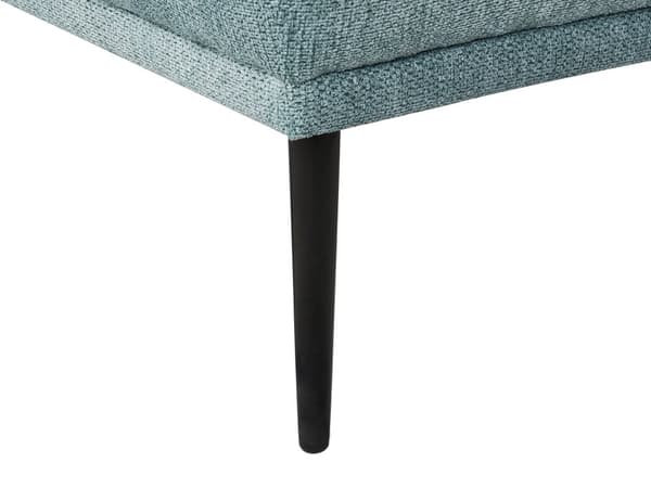 Venstrevendt blå polyester chaiselong med hynde i retrostil i stuen opholdsrum dagligstue