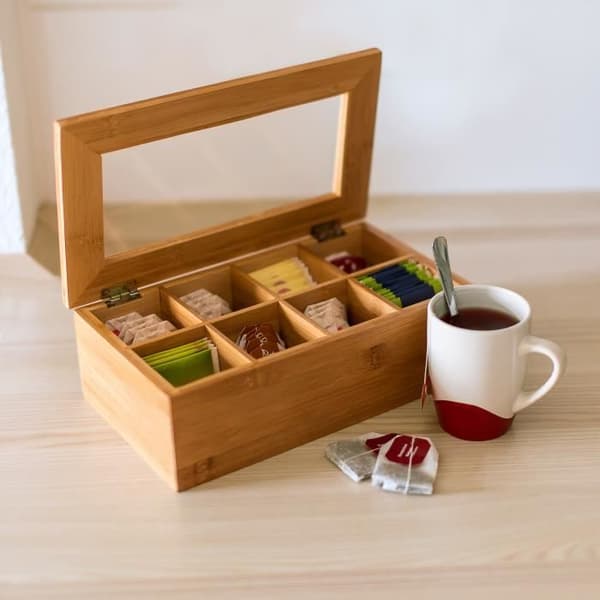 Relaxdays Teaskrin i bambu 8 fackor Förpackning för tepåsar och löste blommor 9 x 28 x 16 cm Transparent fönster, natur