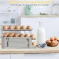 Miniatyrbild 7 av 7: Lollanda Äggbehållare för kylskåp, Äggställ 2-pack 30 ägg, Äggdispenser, Ägghållare – Automatisk Rullning, Vikbar, 2-3 Nivåer