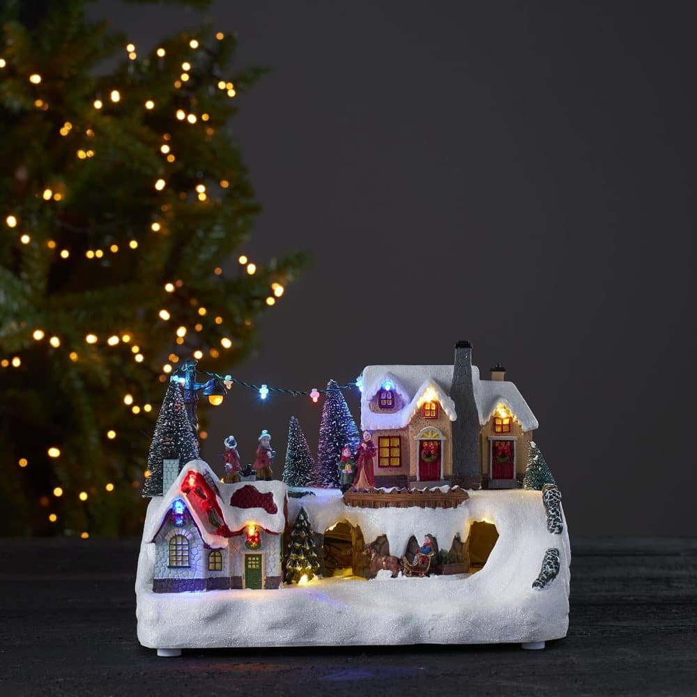 Julby vinterdalen med roterande häst och vagn