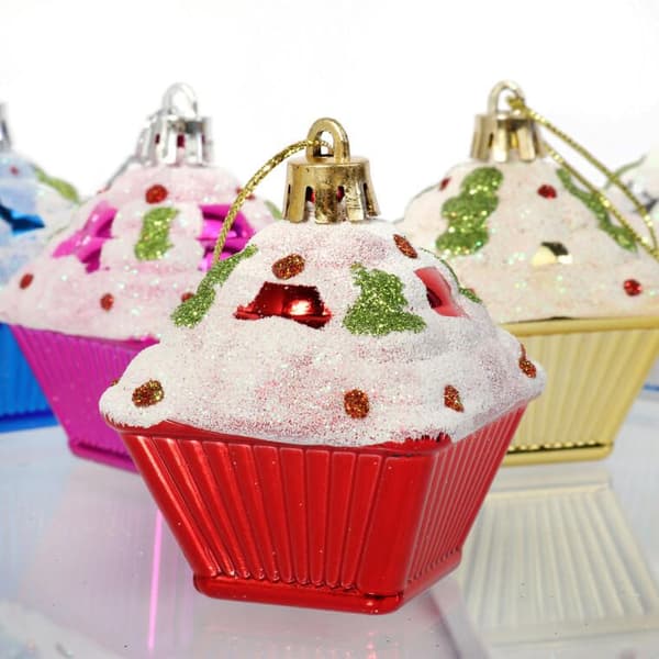Set med 5 färgglada julgranskulor i form av muffins med glitterdekor
