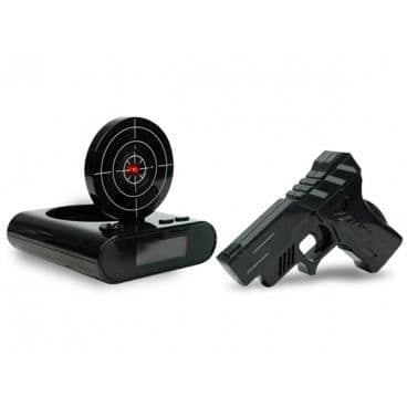 Svag väckarklocka med mål och pistol ovanlig vit rolig morgonklocka