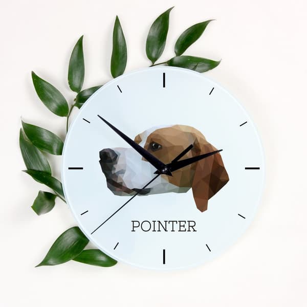 Pointer - et geometrisk vægur med et foto og en inskription af Art-Dog-mærket