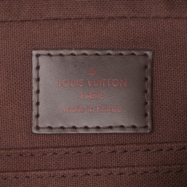 Pre-owned Louis Vuitton Damier Ebene Pochette Billets Macao Brown