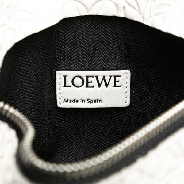 Pre-owned LOEWE Embossed Leather Anagram Repeat T Clutch White