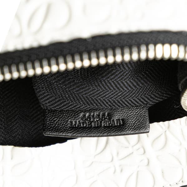 Pre-owned LOEWE Embossed Leather Anagram Repeat T Clutch White