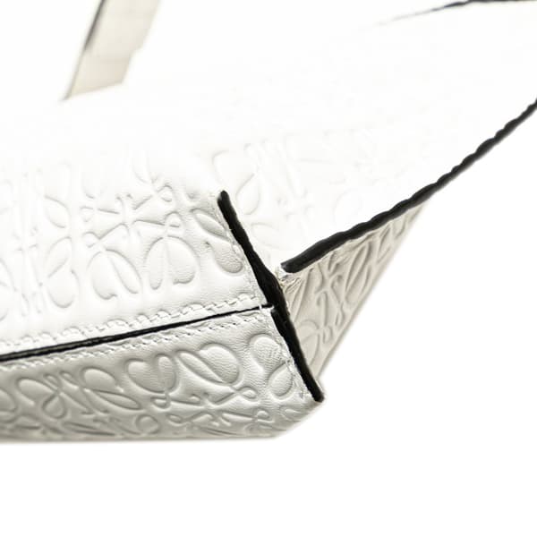 Pre-owned LOEWE Embossed Leather Anagram Repeat T Clutch White