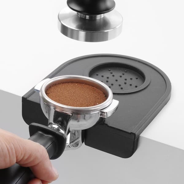 En matta för bänkskivan under kaffetampern - singel