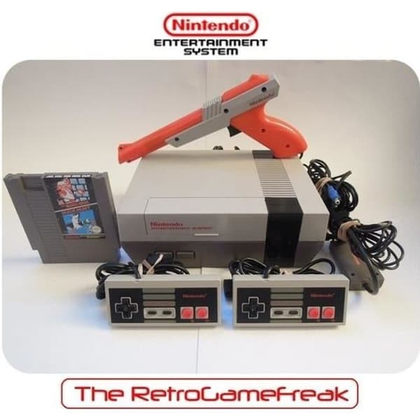 console nintendo nes action set- USED