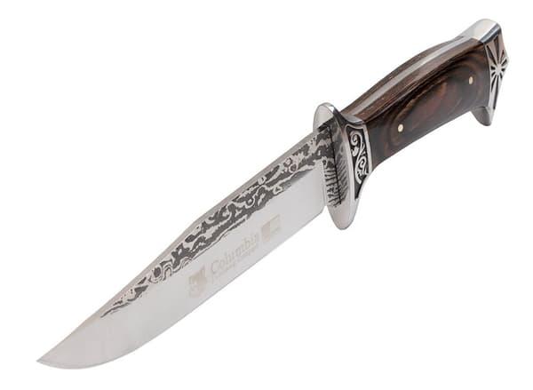 Stor N-182 Columbia jaktkniv med dekorativ gravyr och slida