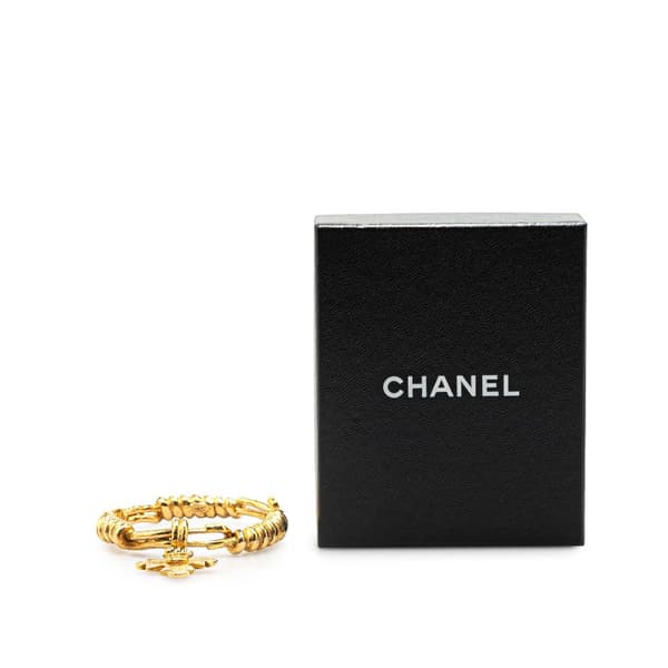 Pre-owned Chanel Gold Plated CC Engraved Cross Bracelet Gold