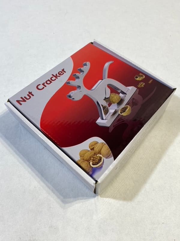 Red nutcracker in the shape of a reindeer in modern lines2-pack