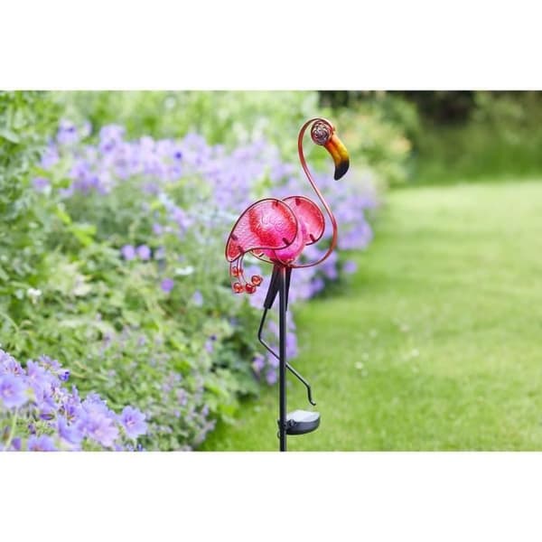 Rosa solenergi lysande metall flamingo att sticka