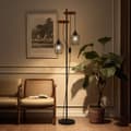 Miniatyrbillede 3 af 9: EMKE industriel gulvlampe – Dobbelt E27-fod, sort jernlampeskærm, brændt træfinish, 1,5 m høj