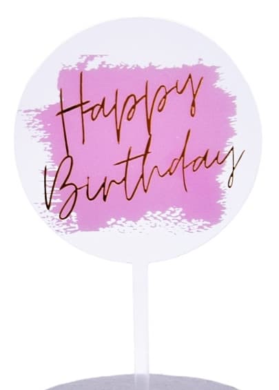 Läpinäkyvä vaaleanpunainen akryylikoriste, jossa kultainen Happy Birthday -teksti