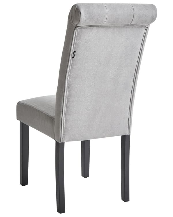 Sæt med 2 grå polstrede stole med sorte træben til en spisestue i glam stil