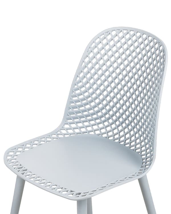 Sæt med 4 stole lyseblå plast syntetisk gennembrudt ryg moderne minimalistisk stil
