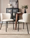 Miniatyrbilde 2 av 10: Sett med 2 spisestoler Kremhvit Polyester Svarte metallben Uten armlener Buet form Moderne design Kjøkken Spisestue
