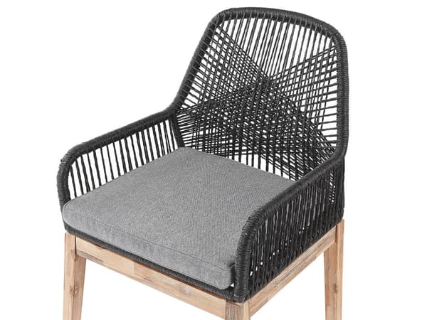 Utendørs spisegruppe Grå Svart Bord i betong 6 flettede stoler Sitteputer Moderne design Hagemøbler