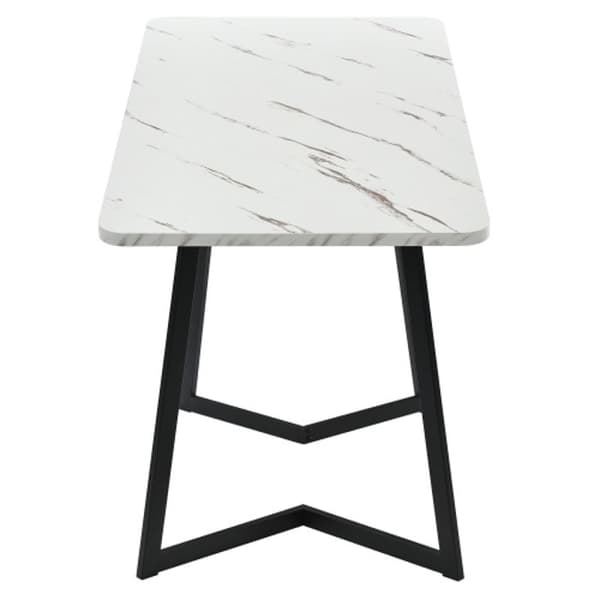 Matsalsmöbelset (bord 117 x 68 x 75 cm och 4 stolar) Vit MDF-skiva, svarta ben.