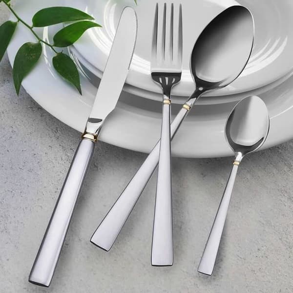 Set med bestick 24 delar för 6 personer i rostfritt stål 18/10 Maestro silver/guld